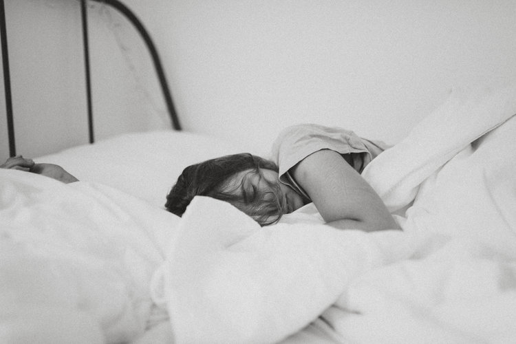 good sleep. Black and white photo of young woman sleeping soundly